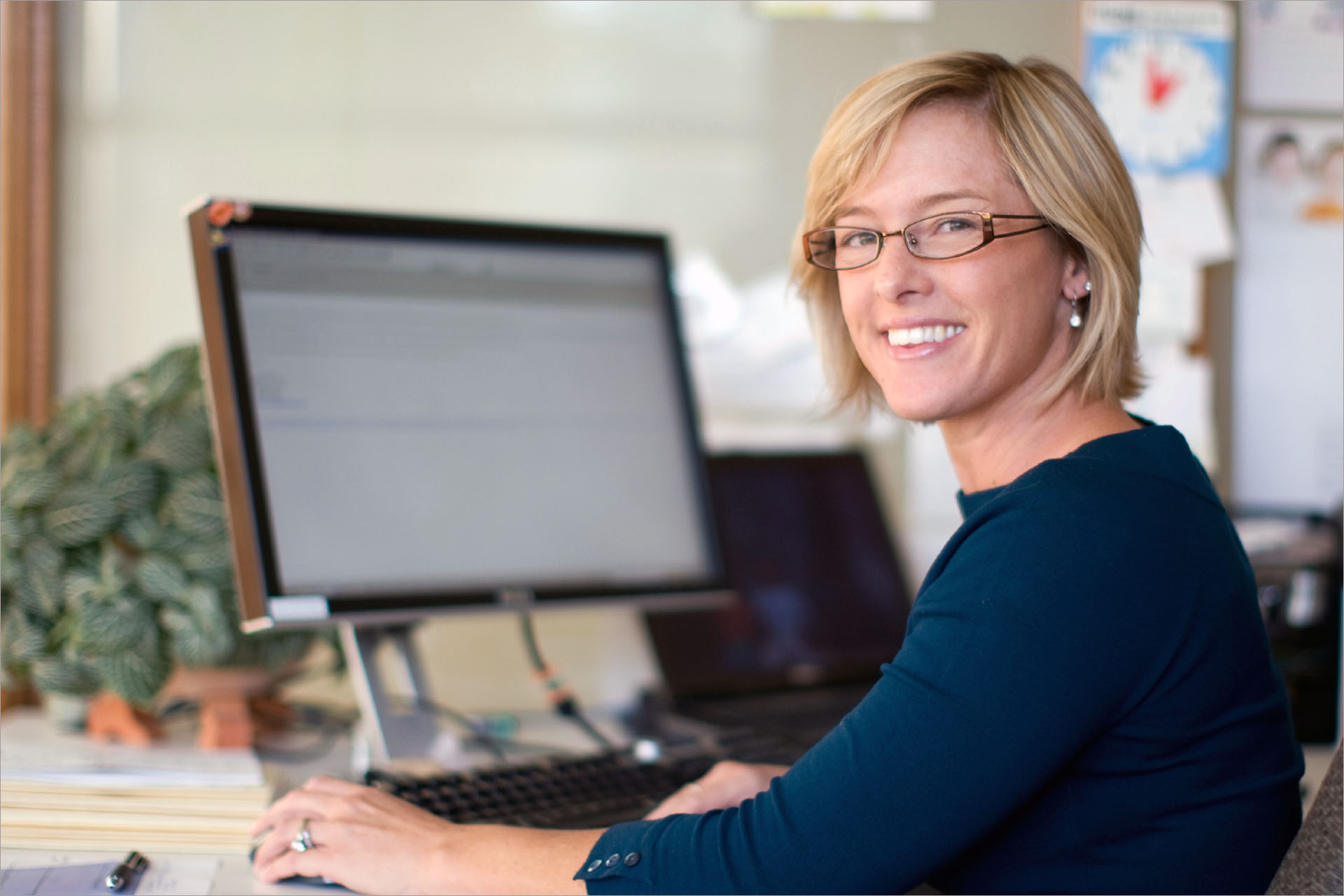 Patient Power USA health care advocate at her desk